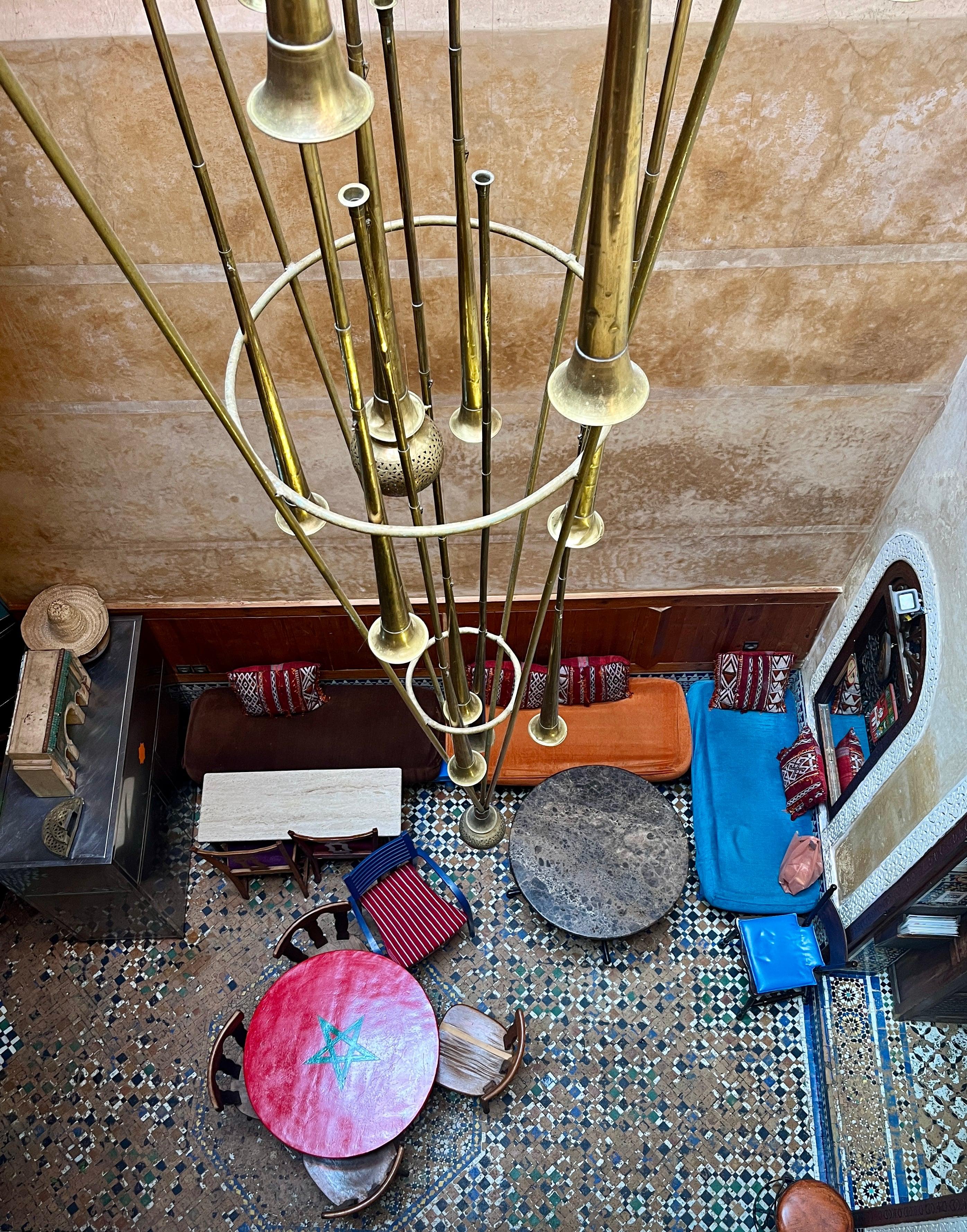 Traditional Moroccan riad courtyard with mosaic floors