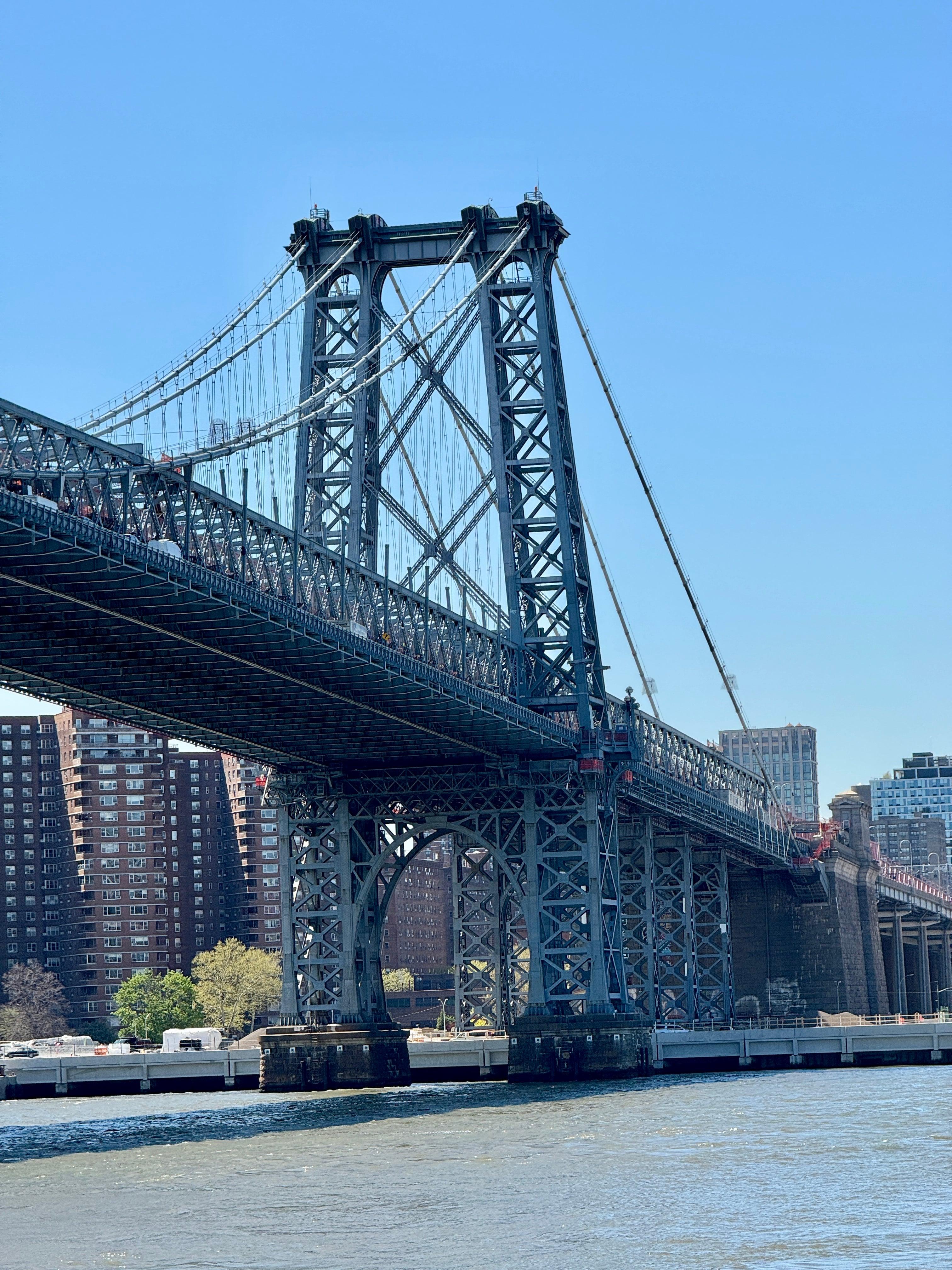 Williamsburg Bridge steel tower seen from the East River