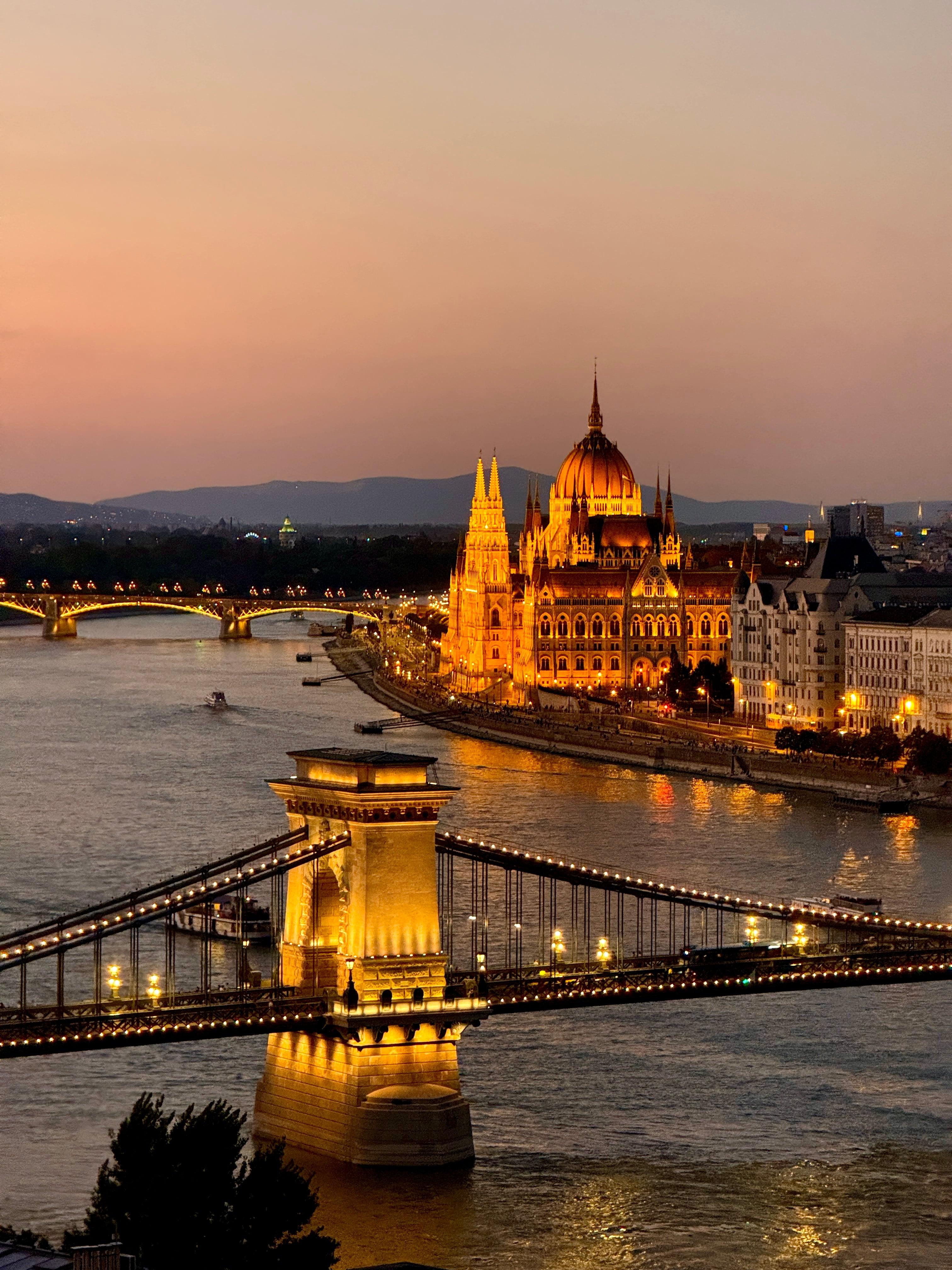 Hungarian Parliament and Chain Bridge along the Danube at sunset