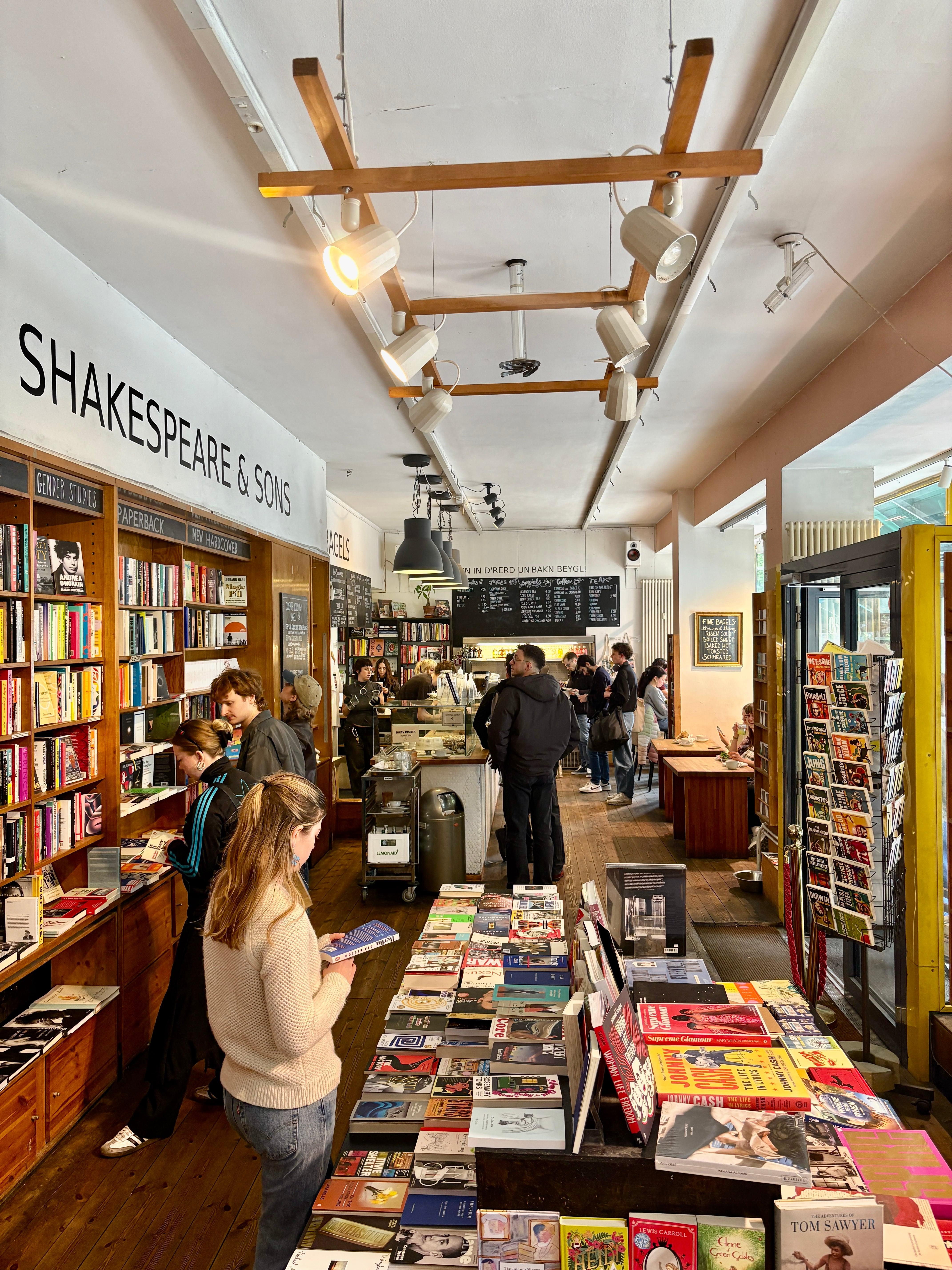 Shakespeare and Sons bookshop interior with customers browsing